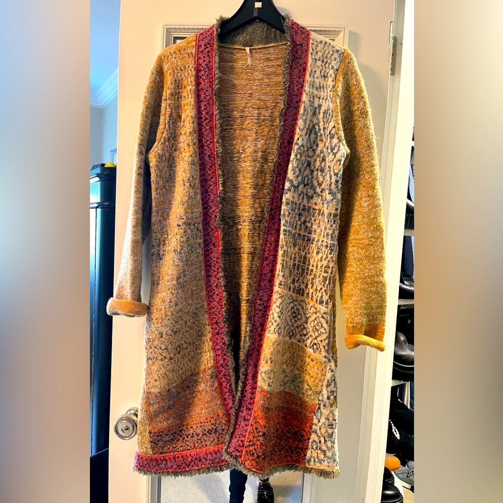 Free People multi-color sweater coat - used.  Cute and funky.  Side pockets.